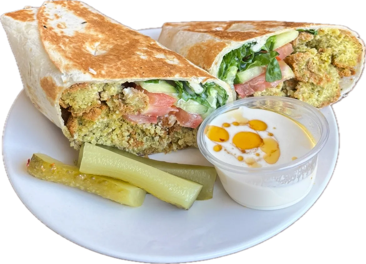 Kolaj Falafel - Falafel served with fresh tomatoes, pickles, lettuce, and creamy tahini sauce.